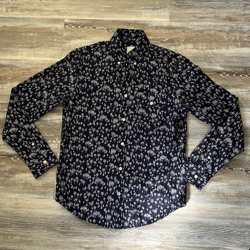 Men’s Gap Designer Shirt highlighted by white snowflakes and winter theme